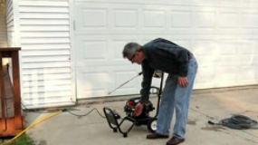 Starting an electric pressure washer.